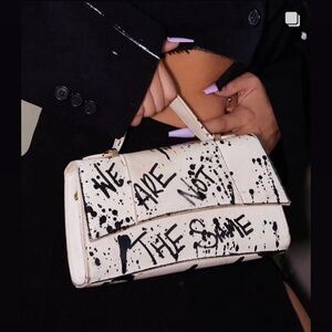 We Are Not The Same Purse